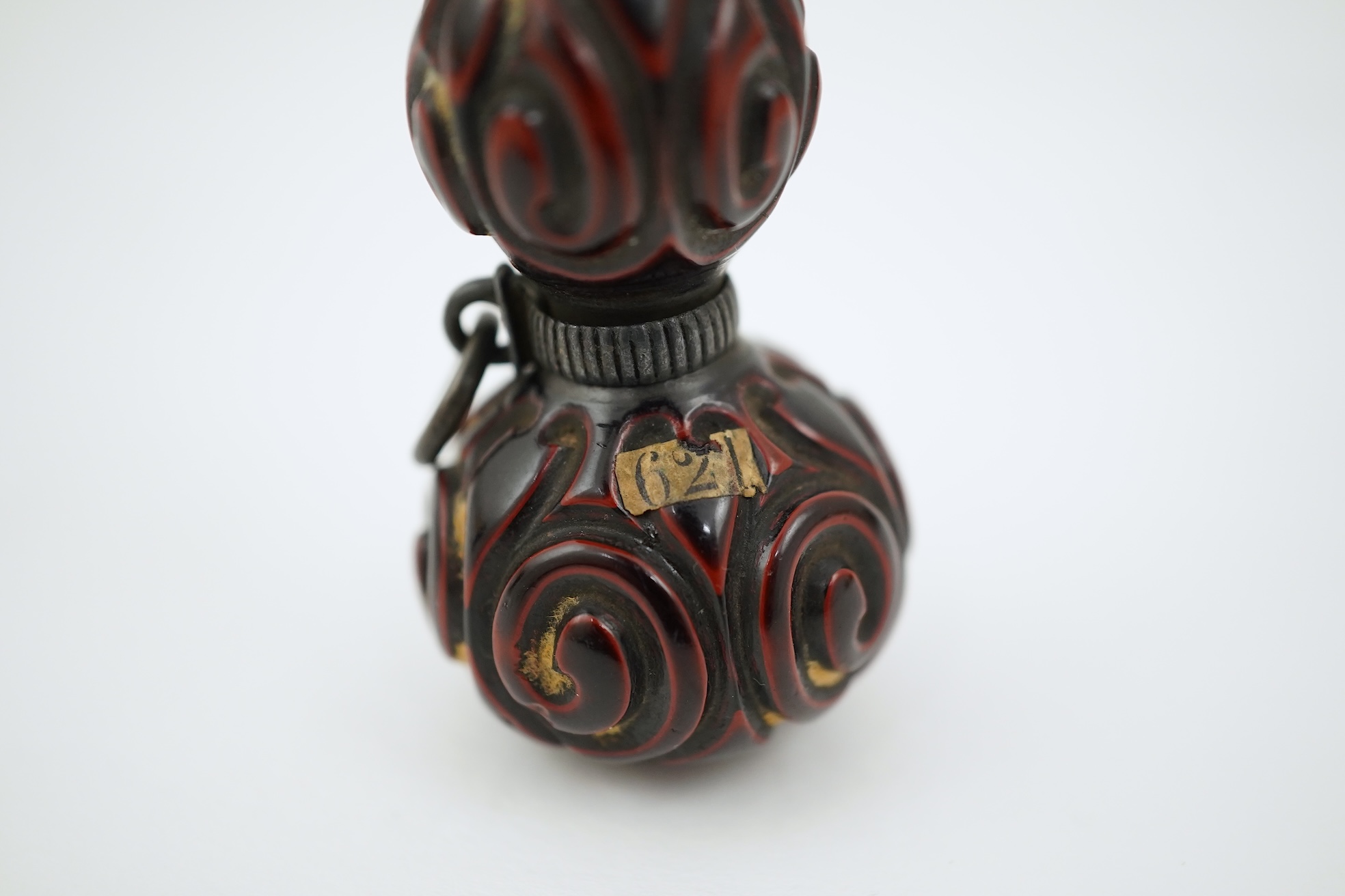 A Japanese guribori lacquer double gourd shaped netsuke, Edo period, late 18th/early 19th century